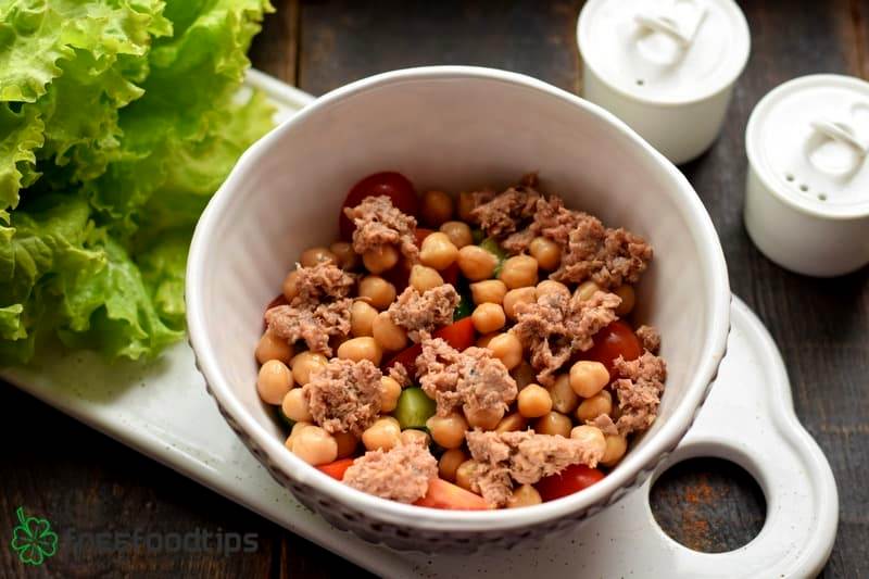 Add drained chickpeas and tuna