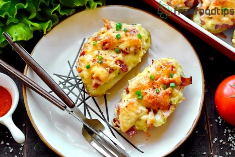 Baked potato halves with bacon and cheese