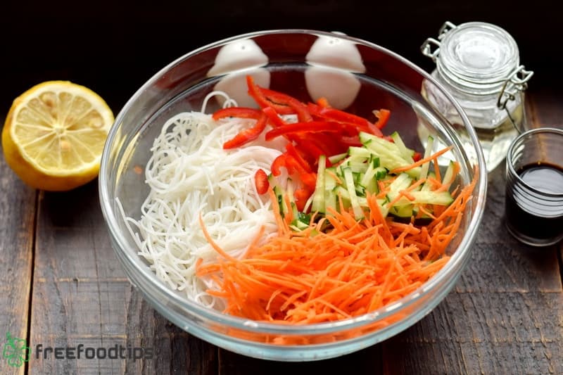 Place vegetables and noodles in a deep bowl Place vegetables and noodles in a deep bowl