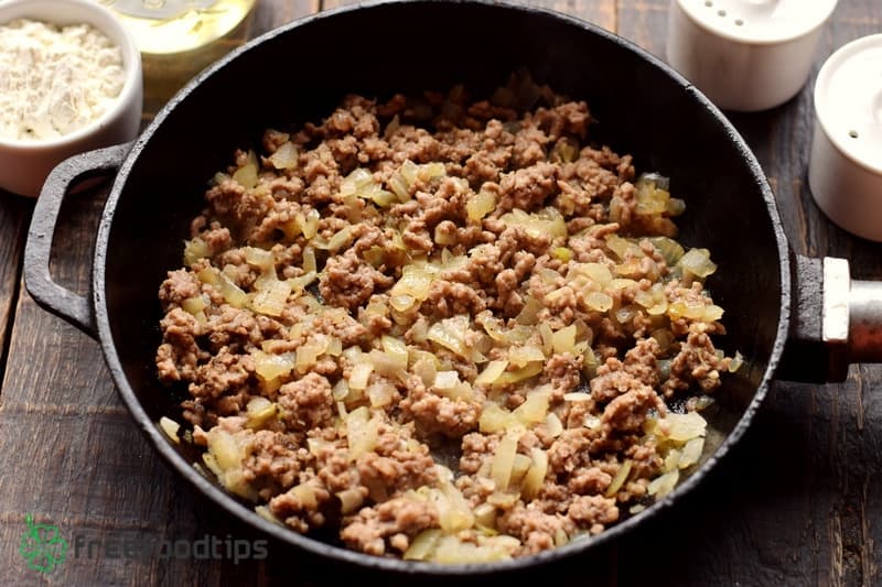 Cook ground beef with onion in the skillet
