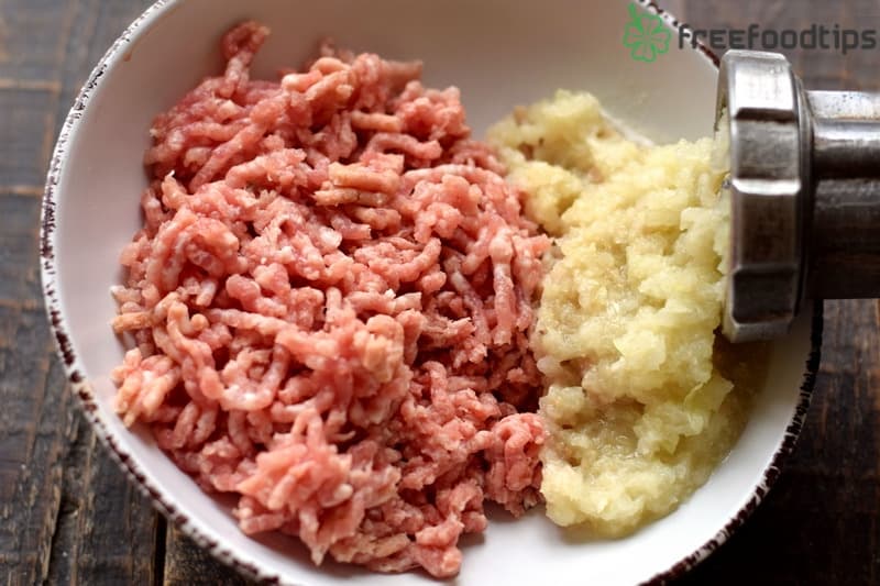 Put onion through a meat-grinder Put onion through a meat-grinder